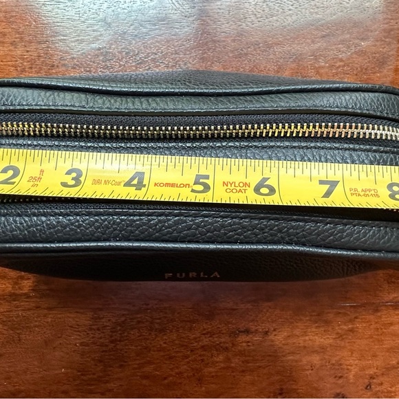 Furla Black Oval Crossbody Bag with Elegant Design and Reversible Strap - Picture 7 of 8